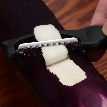 Rotating non-slip vegetable and fruit peeler